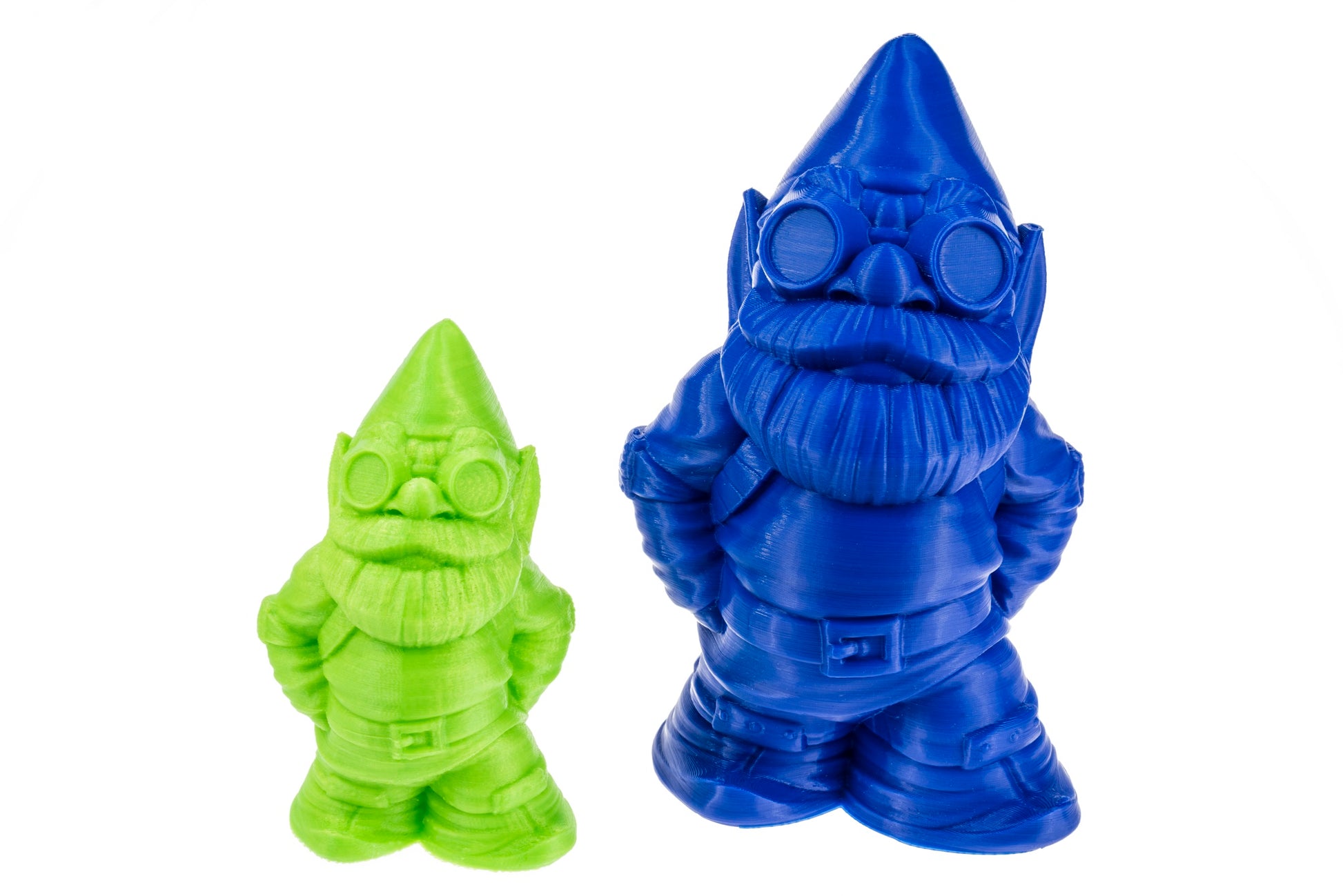 Two 3D printed gnomes showing light green and navy blue color options when printed